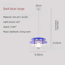 Space Age Acrylic Colorful Pendant Light featuring dark blue acrylic disks and adjustable hanging wire.