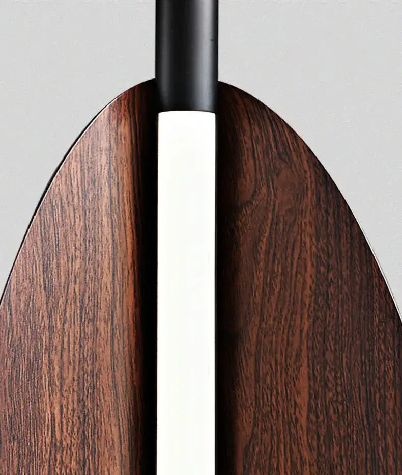 Modern Brown Leaf Wall Light – Sculptural LED Wall Sconce in Metal close-up of rich brown finish and sleek design.