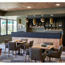 Modern Glass Pendant Light – Italian-Inspired LED Suspension Lamp illuminating a stylish restaurant interior