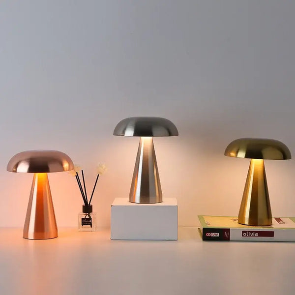 Touch Dimming Rechargeable USB Metallic Table Lamp trio showcasing different metallic colors and stylish designs.