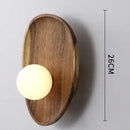 Vintage Walnut Wall Light with frosted glass globe, 26CM height, combines nature and vintage aesthetic.