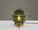 Modern Nordic Glass Table Lighting Fixtures in green with gold base, dimensions 20cm x 15cm x 24cm.