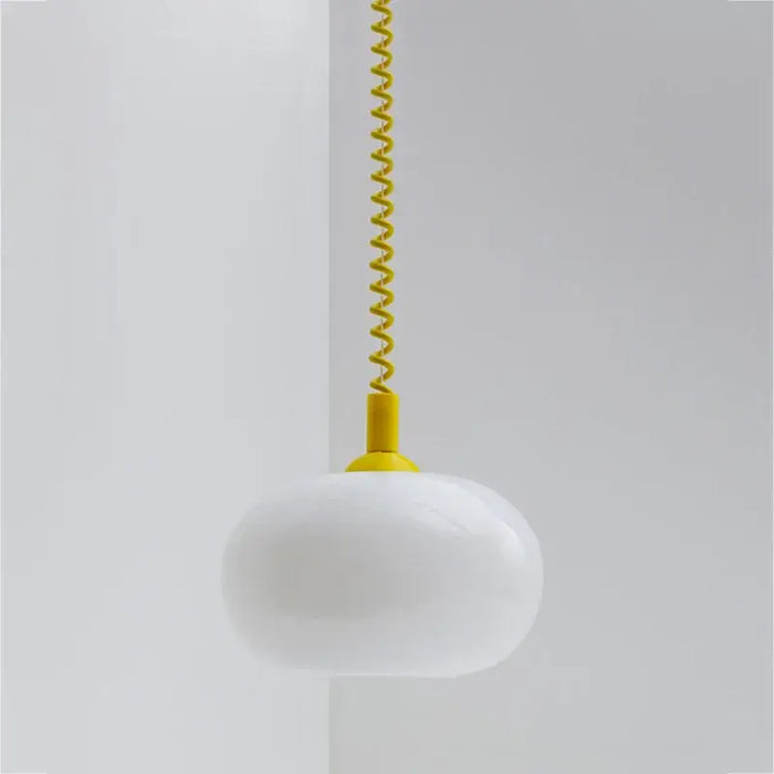 Bauhaus Glass Chandeliers with bright cord, featuring a white hand-blown glass shade and vibrant yellow spiral cord.