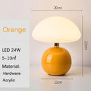 Mushroom LED USB Table Lamp in Pink – Soft Glow Bedside Lighting, orange LED lamp with modern design and soft light.
