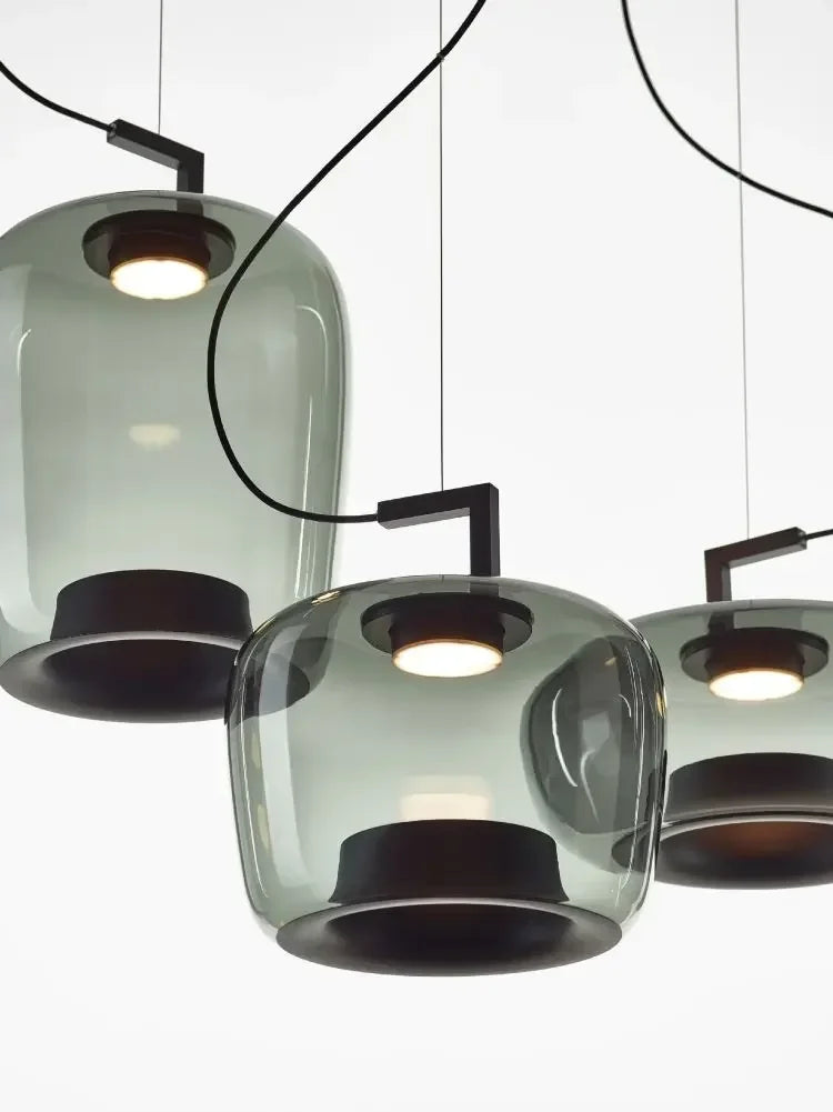 Modern Glass Pendant Light with Iron Detailing