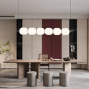 Modern Diffused Light Strip Pendant | Elegant Lighting Solution above a contemporary dining table setting.