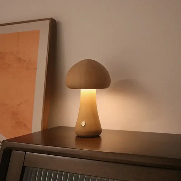 Portable Dimmable 60s Italy Designer Mushroom Table Lamp on wooden table with warm light.