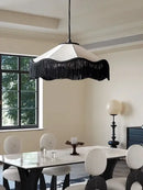 French Retro Fabric Pendant Light – Art Deco Fringe Chandelier for Bedrooms & Lounges in a stylish dining room setting.