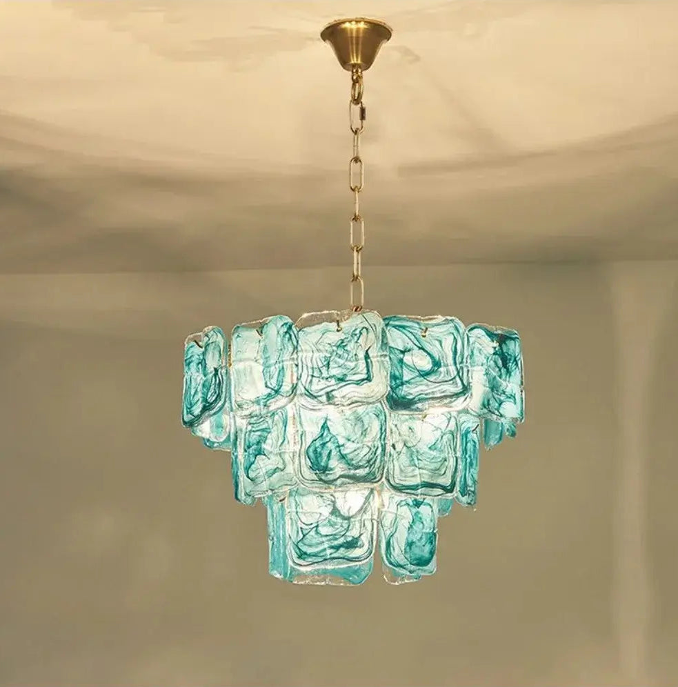 Blue Glass Chandelier with Polished Chrome Finish hanging elegantly, showcasing handcrafted shades and contemporary design.