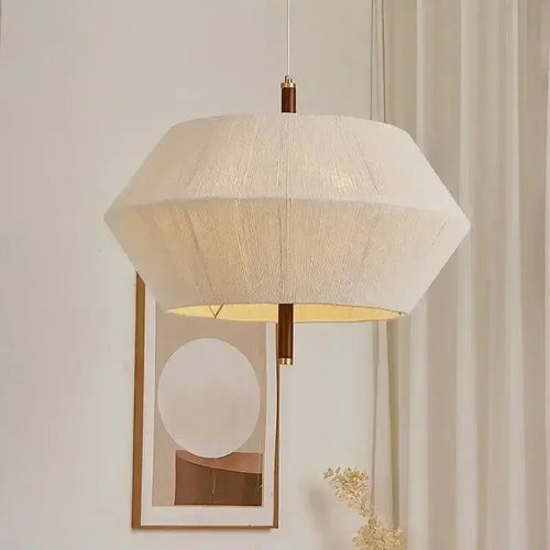 Japanese Retro Woven Fabric Chandelier hanging elegantly with subtle lighting in a modern interior.