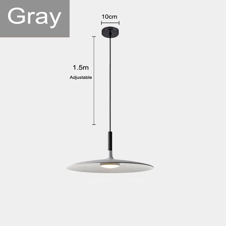 Sleek, Modern Led Pendant Lamps in gray color with adjustable height and minimalist design.