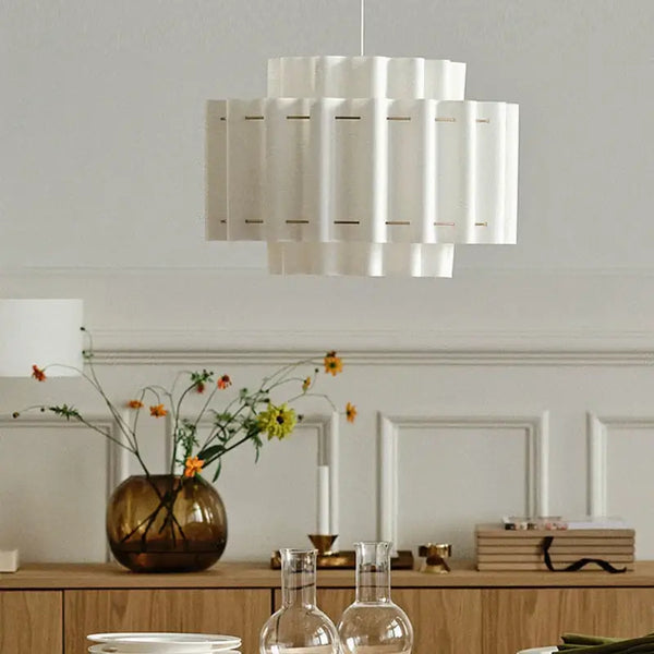 Nordic Wabi-Sabi Fabric Pendant Light 50cm hanging above a dining table with floral decor.