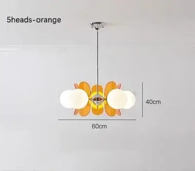 Rare Mid-Century Orange Plexiglass Chandelier: A Unique Vintage Gem with orange reflectors and white frosted glass balls.