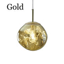 Nordic Lava Pendant Light in gold finish with a unique bubble design and warm illumination.