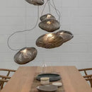 Nordic Cloud Glass Pendant Light – Smoky Grey Designer LED Chandelier hanging over a wooden dining table.