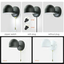 Semi-Sphere Switch or Plug Wall Lights in black and white with zipper switch and plug options.
