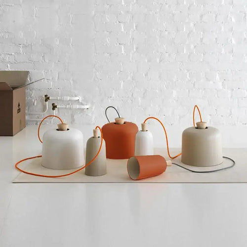 Colourful, modern, metal Danish Light Pendant displayed in various colors, showcasing minimalist elegance and design.