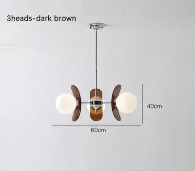 Rare Mid-Century Orange Plexiglass Chandelier: A Unique Vintage Gem, featuring three heads and dark brown accents.