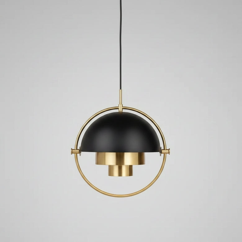 Gold and black pendant light on a white background