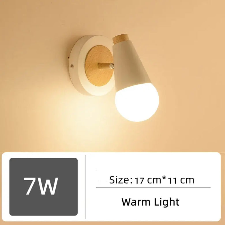Wood and Frosted Glass Japanese Minimalist Sconces illuminating a warm light in a modern design.