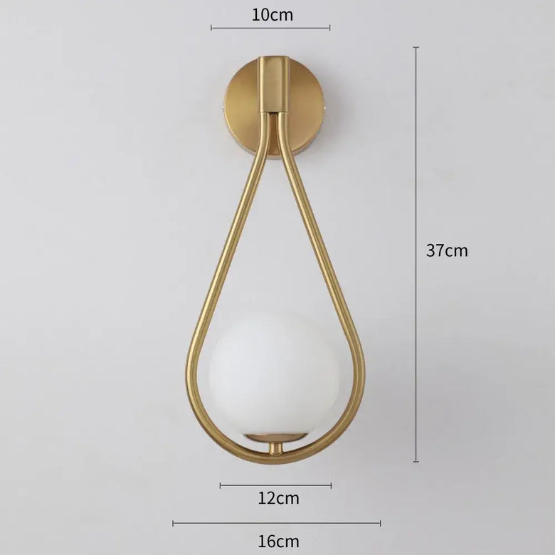 Drop Luxury Glass Ball Wall lamp with a modern minimalist design in gold, featuring a sleek glass ball for elegant illumination.