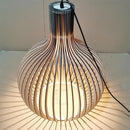 Nordic Retro Modern Wood Cage Pendant illuminating stylishly with wooden slats and cord.