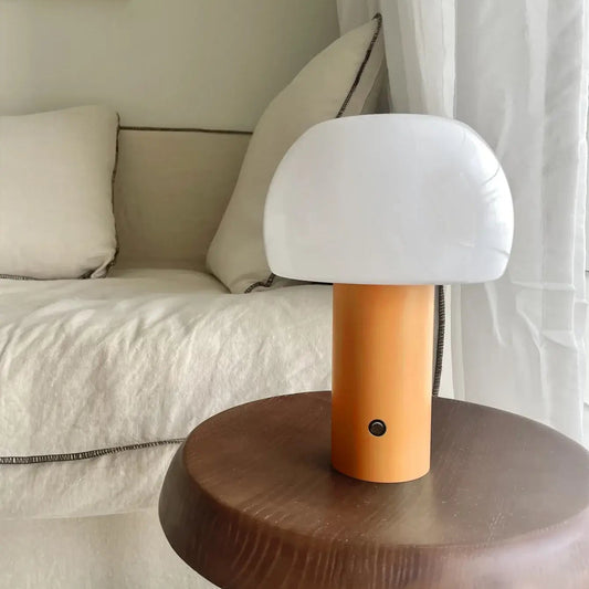 Modern Mushroom LED Table Lamp – Rechargeable & Portable Light on a wooden stool in a stylish room