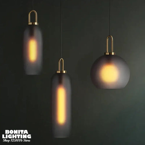 Grey Frosted Sphere Glass Hanging Lamp with unique design and warm glow, perfect for any room in the house.