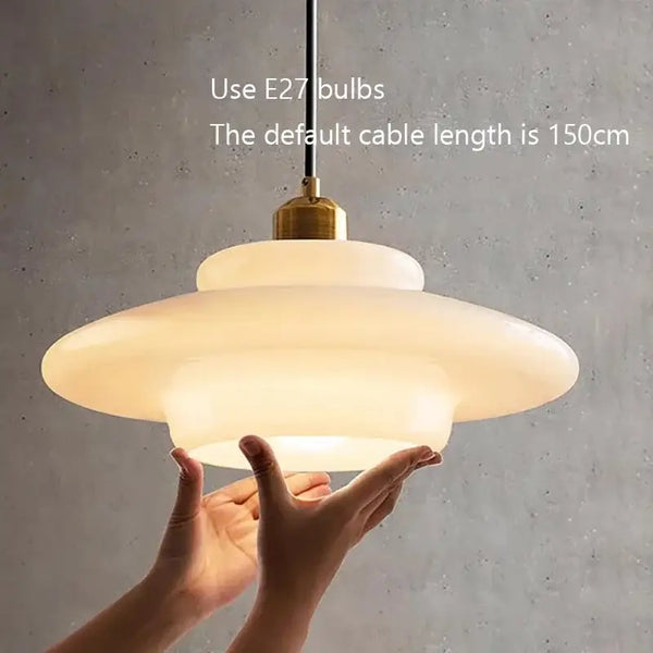 Nordic Vintage Pendant Light | Scandinavian Chic Decor being held, showcasing cream wind milk glass and E27 bulb usage.