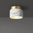 Italian Marble Downlight in Marble illuminating a modern interior with minimalist design.