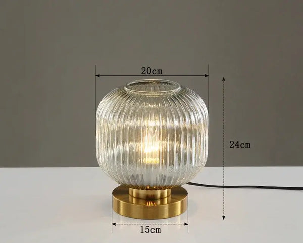 Modern Nordic Glass Table Lighting Fixtures with ribbed glass design and gold base, perfect for elegant decor.