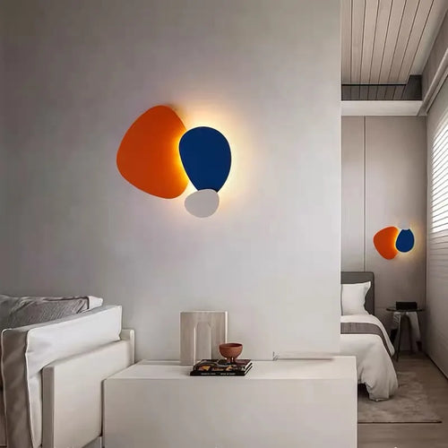 Modern interior with colorful wall lights in a room.
