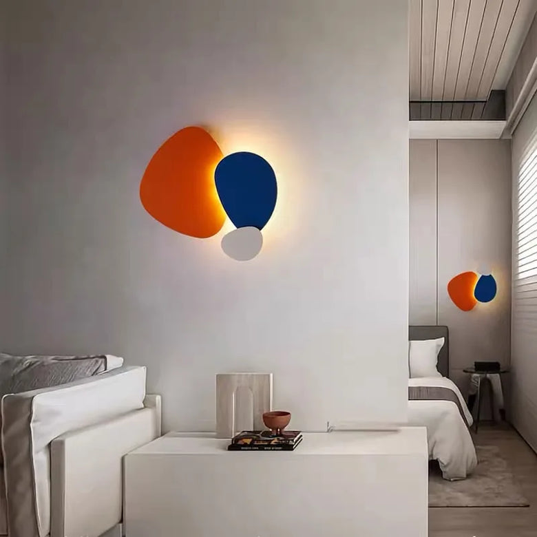 Modern interior with colorful wall lights in a room.