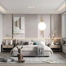 Modern Simple Art Deco Revival Wall Lamp illuminating a stylish bedroom with contemporary decor and cozy furnishings.