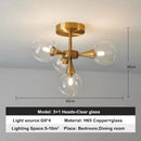 Modern Copper Glass Ball Chandelier with clear glass shades and copper finish for stylish decor in bedrooms and dining rooms.