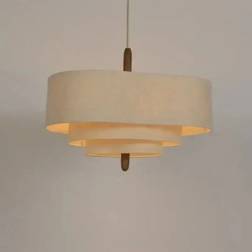 Elegant Linen Fabric Chandelier hanging lamp with soft glow, transforms any space with chic design.