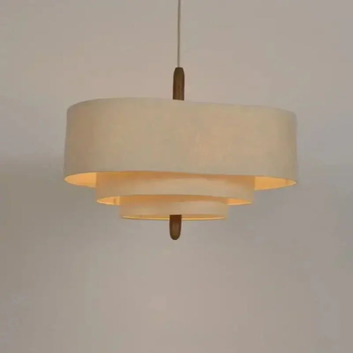Elegant Linen Fabric Chandelier hanging lamp with soft glow, transforms any space with chic design.