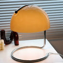 80s USB desk lamp in various colours featuring a yellow dome shade and chrome base.