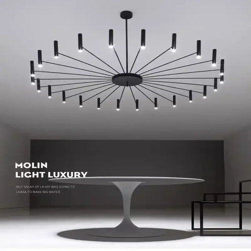 Modern Starburst LED Chandelier – 24-Light Sculptural Ceiling Statement in sleek black finish above a modern table.