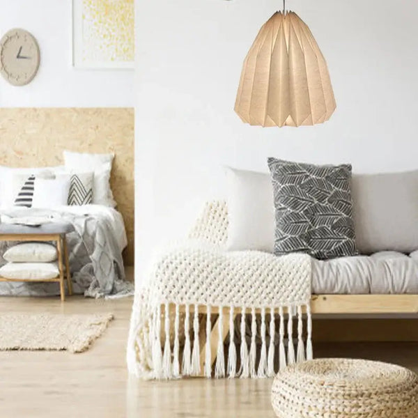 Elegant Origami-Inspired Paper Lantern illuminating a cozy living room with modern decor.