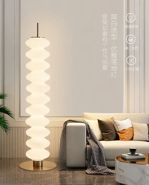 Danish Gourd Sculptural Floor Lamp – Nordic White Acrylic LED Lamp styled in modern living room with cozy sofa.
