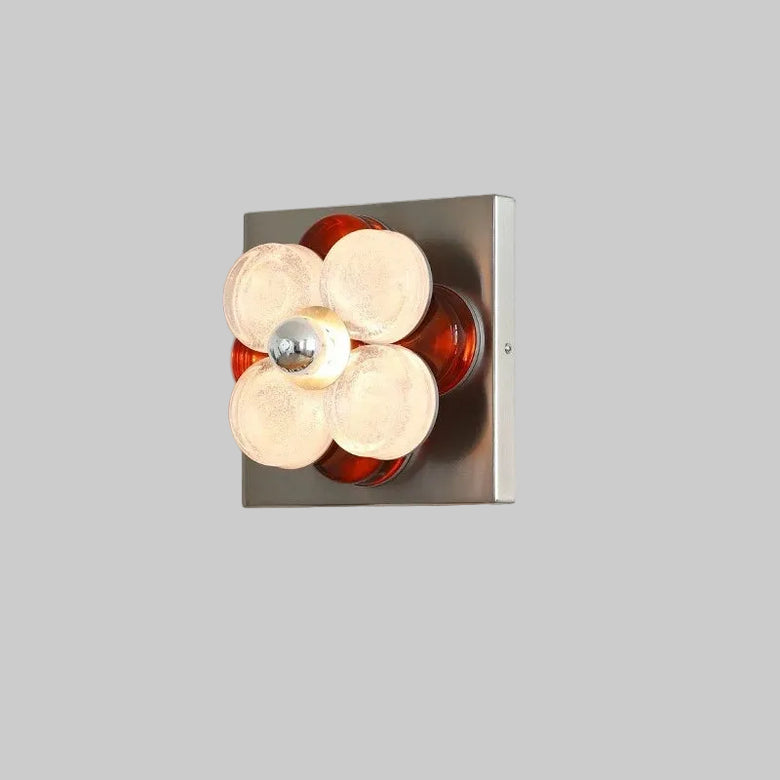 hero Modern wall light fixture with glass shades on a neutral background