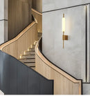 Lollipop Art Deco Wall Light Fixture illuminating a stylish staircase with modern architectural design.