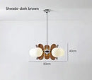 Rare Mid-Century Orange Plexiglass Chandelier: A Unique Vintage Gem with dark brown design and frosted glass balls.