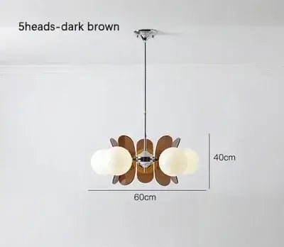Rare Mid-Century Orange Plexiglass Chandelier: A Unique Vintage Gem with dark brown design and frosted glass balls.