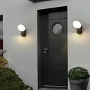 Modern Simple LED Outdoor Wall Lamp illuminating a stylish entrance with a sleek design.