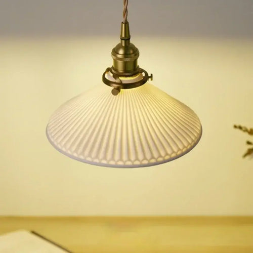 White Ceramic Lamp Shade with Brass Base – Timeless Elegance hanging lamp detail showcasing elegant design and craftsmanship.