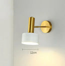 Gold Wall Mounted Spot in Brass and Black Colours featuring a classic design, 12cm height, minimalistic lighting solution.