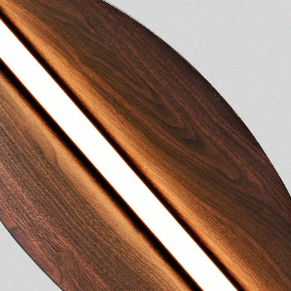 Modern Brown Leaf Wall Light – Sculptural LED Wall Sconce in Metal showcasing a rich brown finish with vertical LED glow.