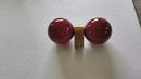 Chic Dual Bubble Wall Light - Modern & Versatile Lighting with polished brass and playful color balls.